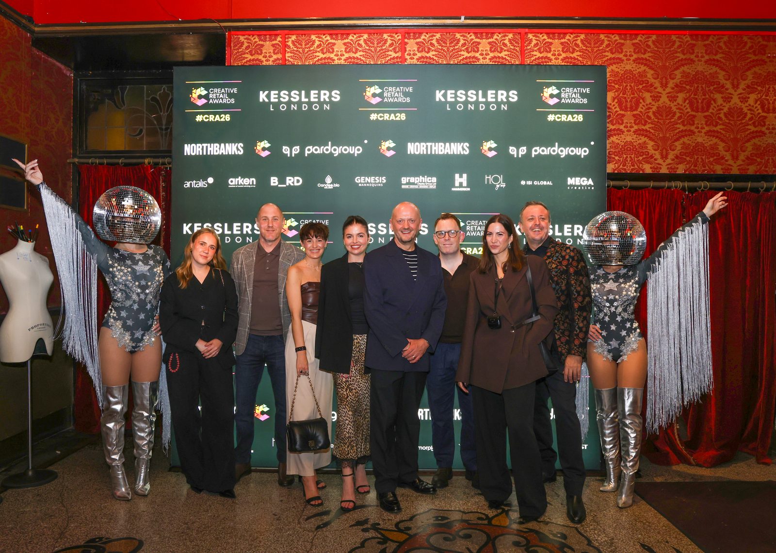 A team photo at the Kesslers London step and repeat