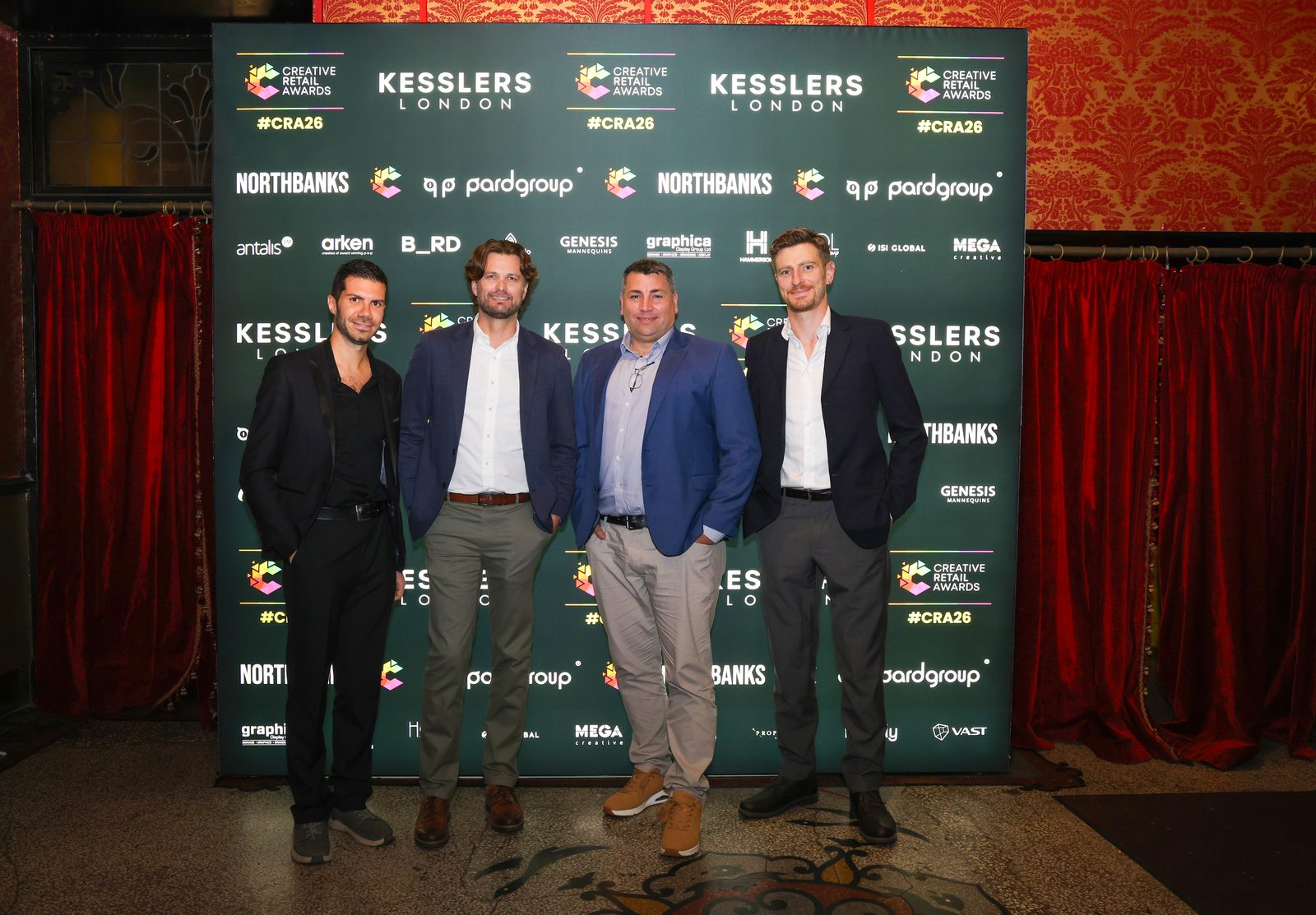 Guests in front of the Kesslers London backdrop