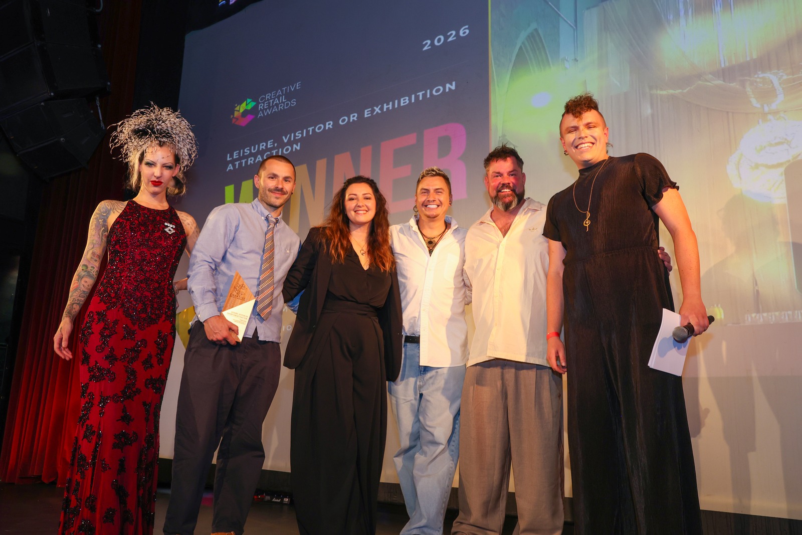 Leisure, Visitor or Exhibitor Attraction winners on stage