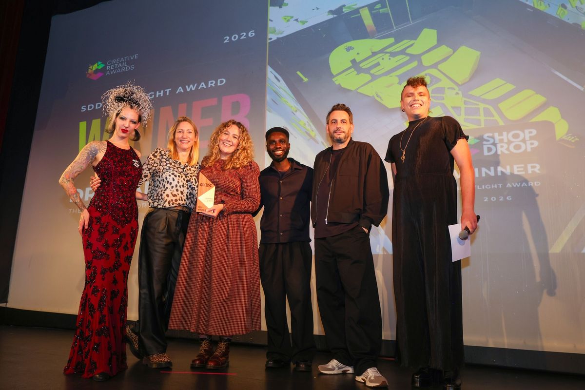 Dr. Martens collecting the SDD Spotlight Award
