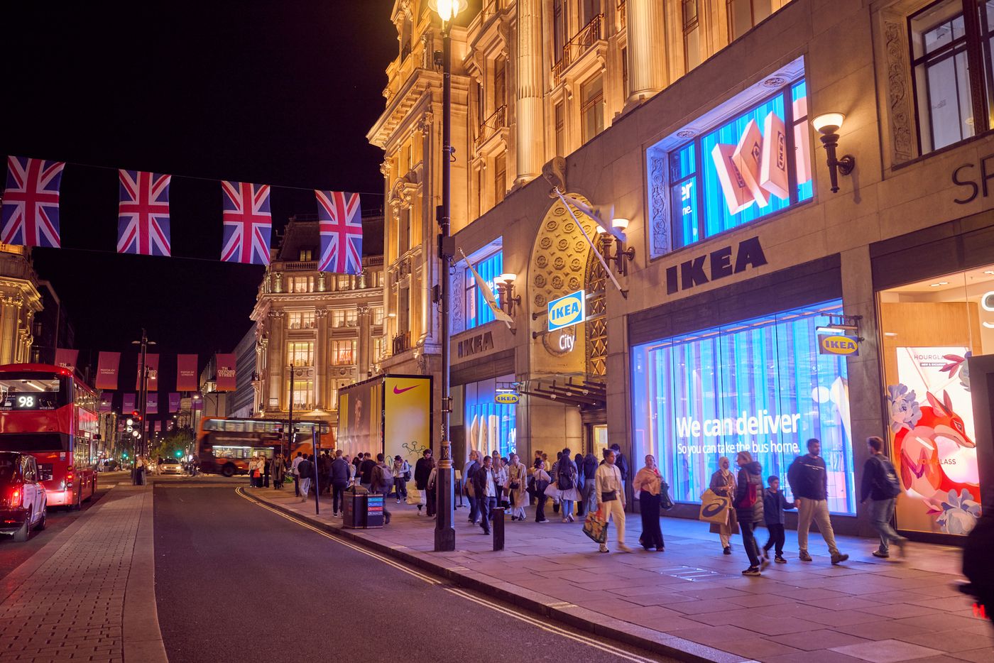 The LED window façade at IKEA Oxford Street at night